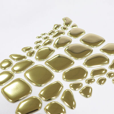 কারখানার কাস্টম ধাতব সোনার টিপিইউ তাপ স্থানান্তর লেবেল - বিলাসবহুল পোশাক ও ফ্যাশন পোশাকের জন্য অনিয়মিত আকৃতির প্রতীক